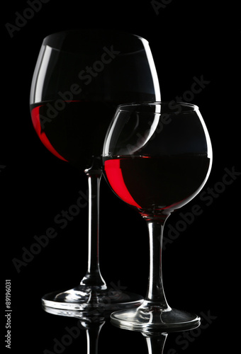 Glasses of wine isolated on black