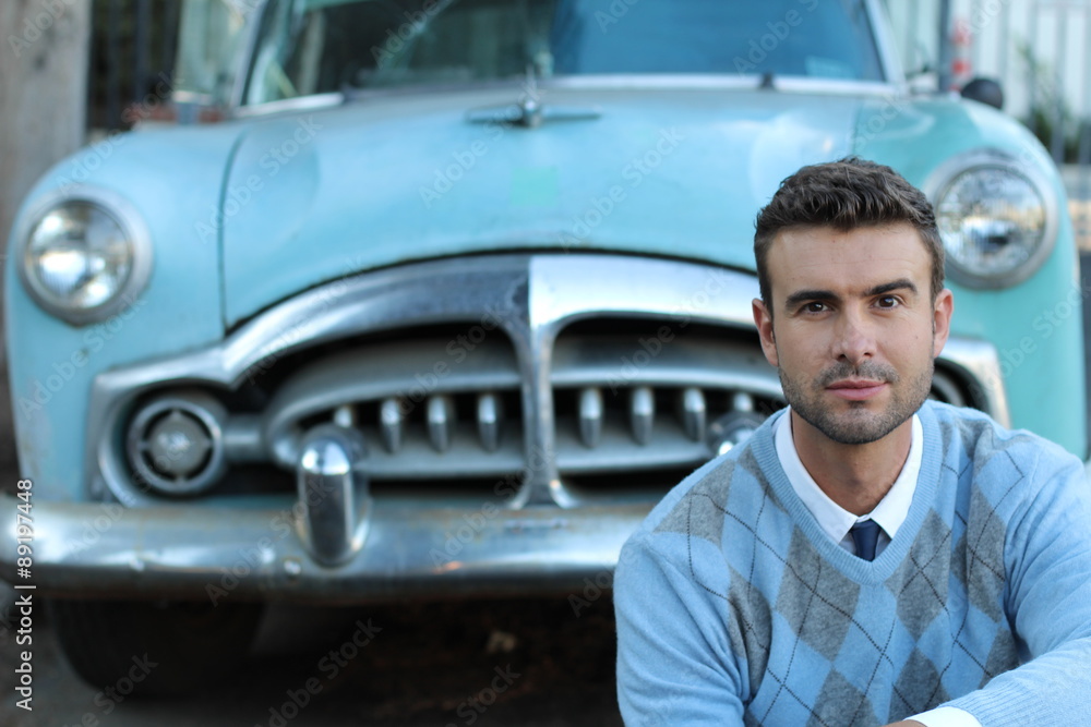 Handsome classic man and a gorgeous retro car Handsome classic man and a gorgeous retro car