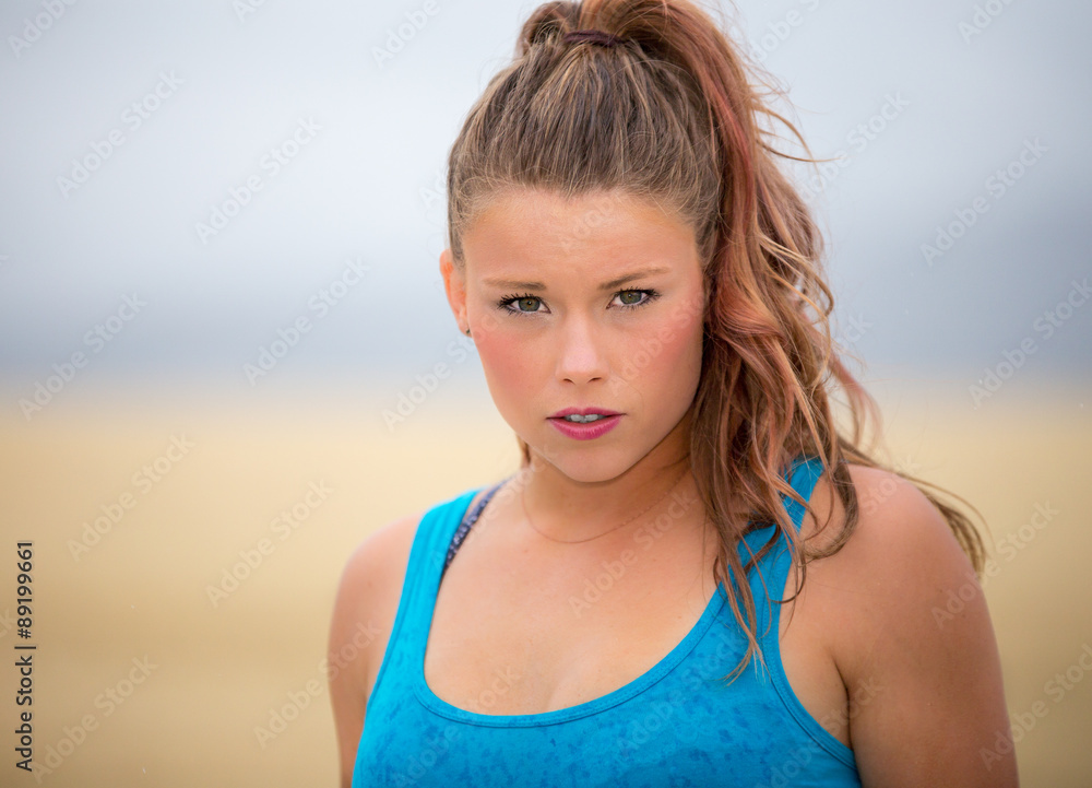 Young woman posing in wheat field. Young woman posing in wheat field.