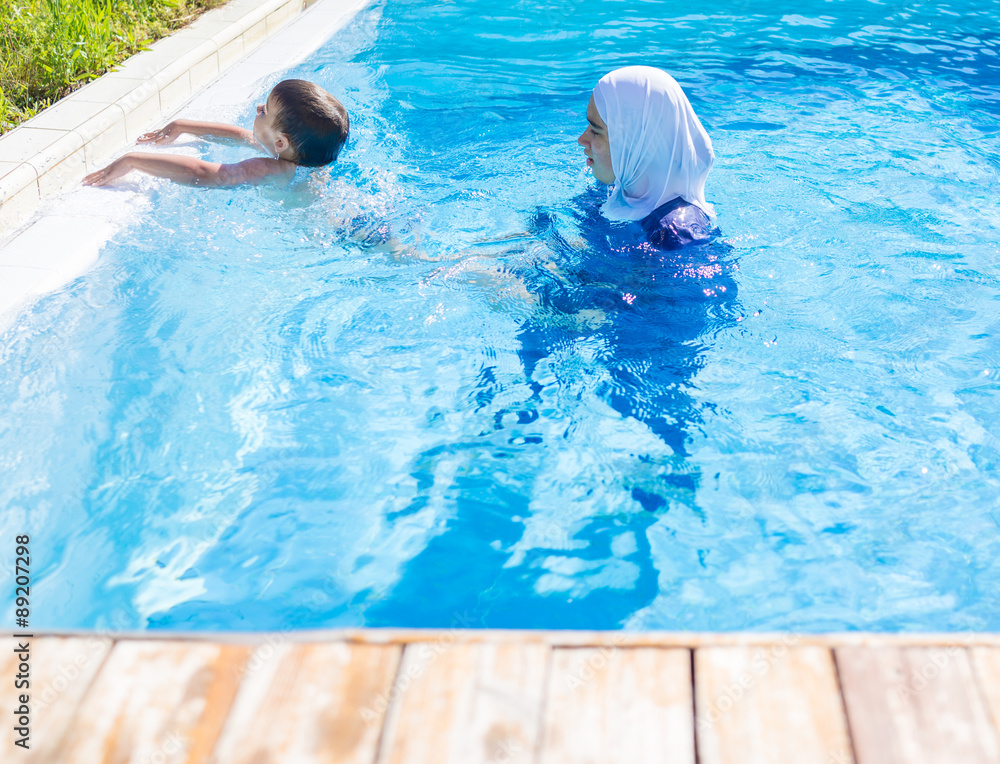 Muslim girl with special swimming suit