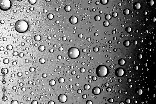 Water drops closeup. Abstract black and white background of waterdrops