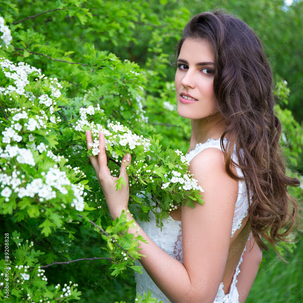 portrait of beautiful woman in wedding dress in blooming summer portrait of beautiful woman in wedding dress in blooming summer