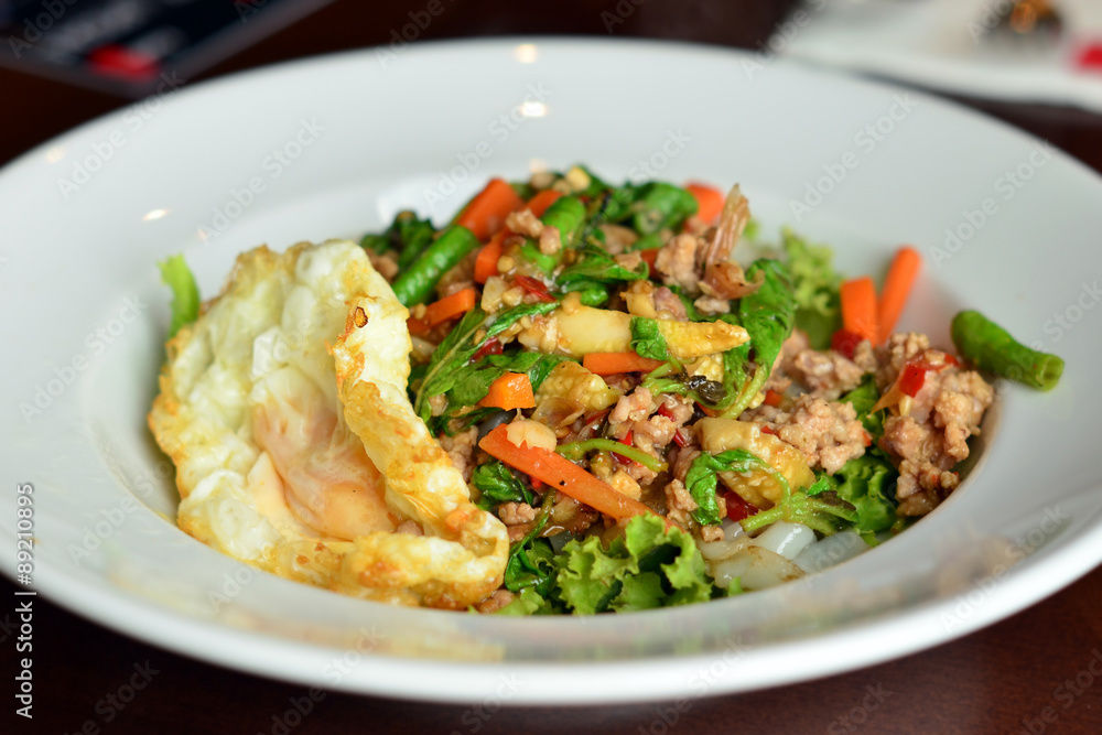 Thai noodle Fried Stir Basil with Minced pork with fried egg Thai noodle Fried Stir Basil with Minced pork with fried egg