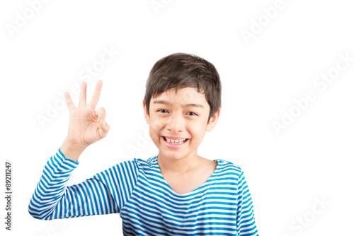 Little boy showing hand ok close up pose