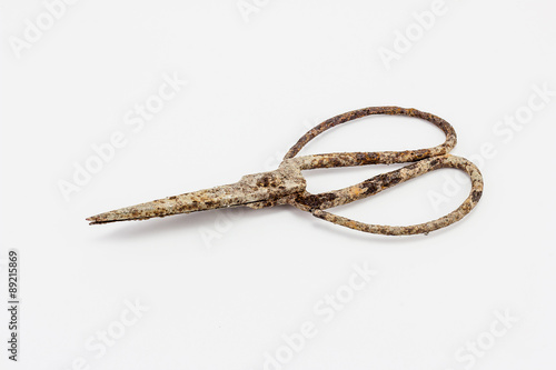 old scissors full of rust isolated on white background © artpritsadee