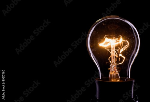 Slika na platnu Lightning inside a glass bulb