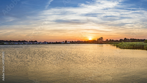 Fotografie sunset in Zinnowitz with   backwater