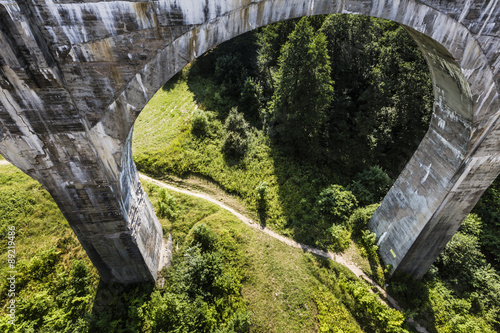 Fototapeta Naklejka Na Ścianę i Meble -  Old concrete railway bridge in Stanczyki, Mazury, Poland