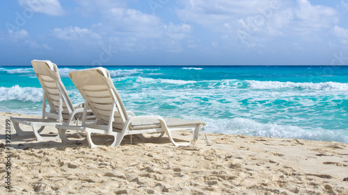Fototapeta Naklejka Na Ścianę i Meble -  chairs on tropical beach