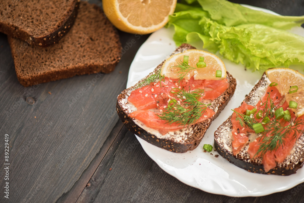 Sandwich with salmon for breakfast Sandwich with salmon for breakfast
