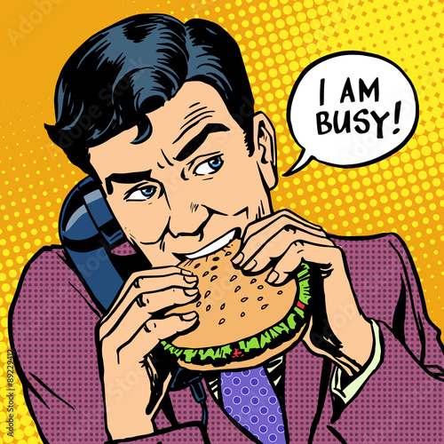 Fototapeta Obiad fast food człowiek jedzenie Burger i rozmawia przez telefon