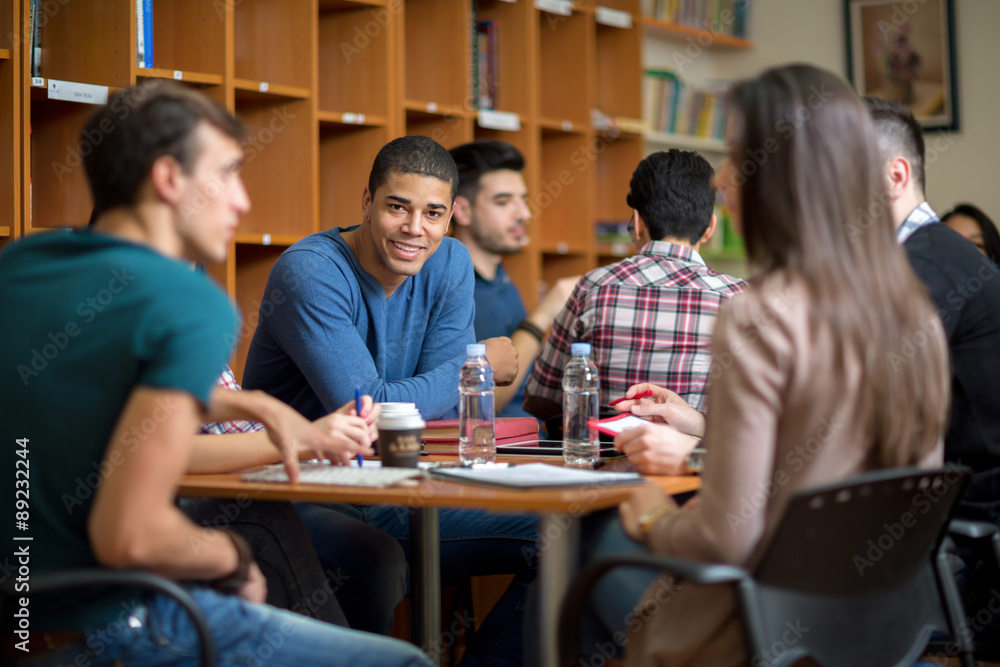 Latino American student socializing with friends Latino American student socializing with friends