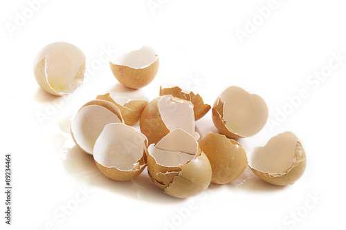 empty broken eggshells isolated on white