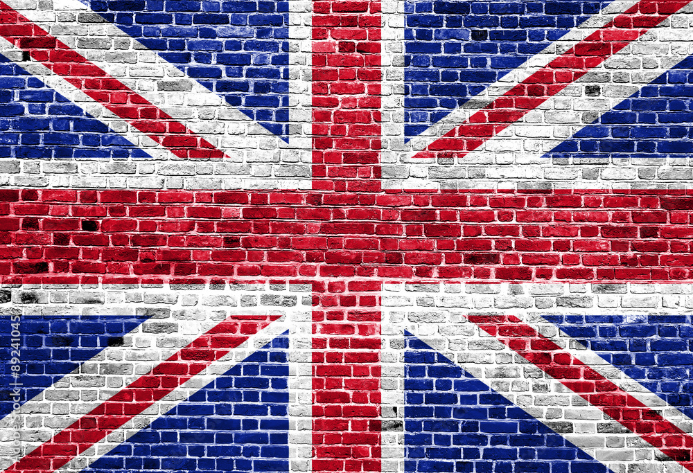 Fototapeta premium Flag of United Kingdom painted on brick wall, background texture