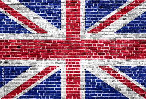 Flag of United Kingdom painted on brick wall, background texture