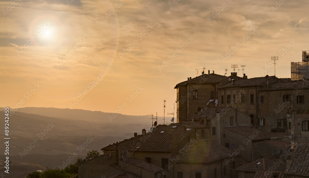 Typical Italian town Volterra overlooking Tuscany during sunset