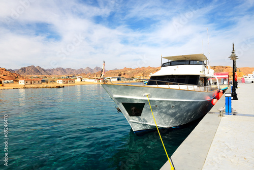 Motor yacht on Red Sea in harbor, Sharm el Sheikh, Egypt