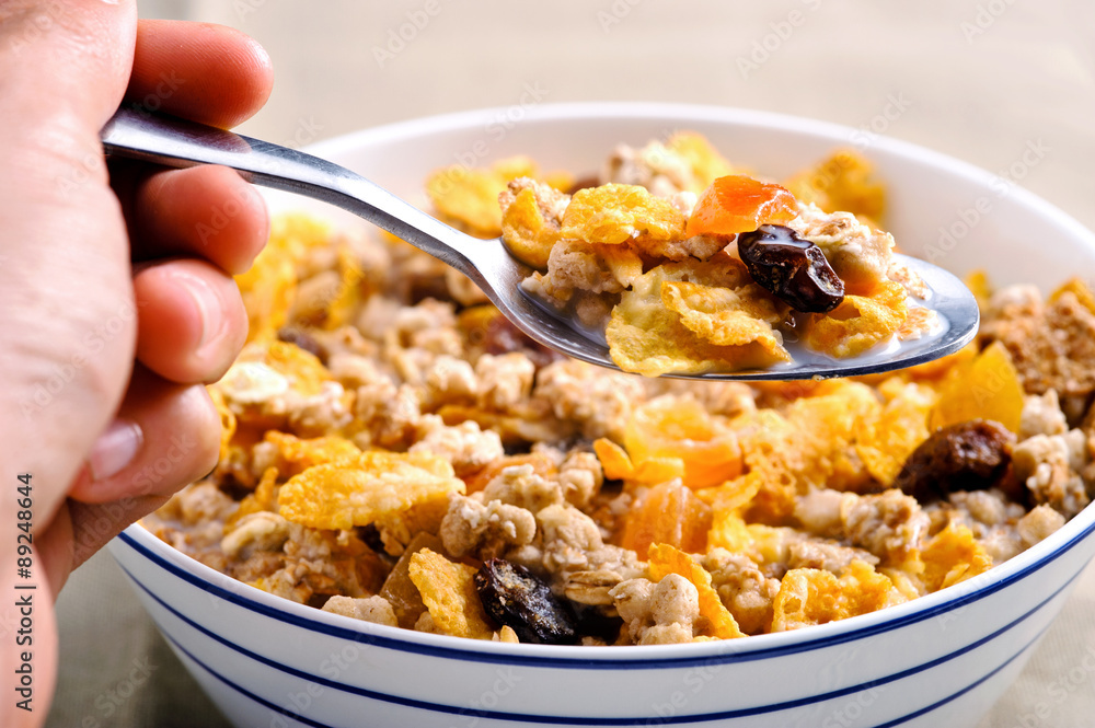 Eating breakfast cereal Eating breakfast cereal