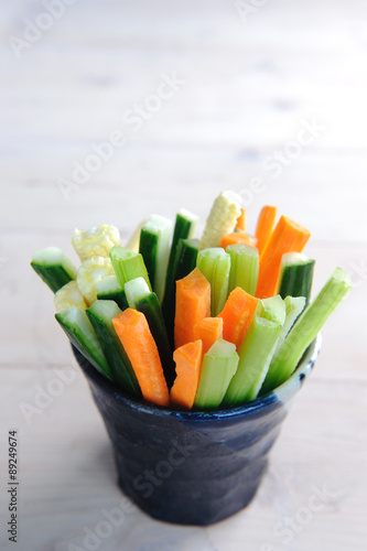 Vegetable sticks in a cup as a healthy snack
