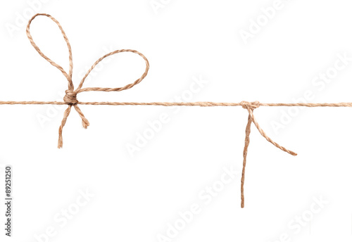 String and bow isolated on white background