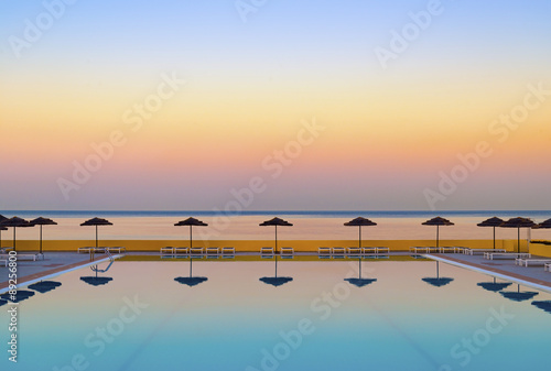 Serene Sunset over a becalmed swimming pool on Rhodes