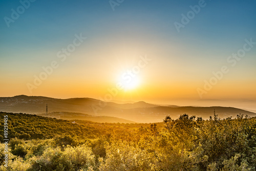Sunset in Ajloun, Jordan. It is located about 76 km north west of Amman, with Israel visible. photo