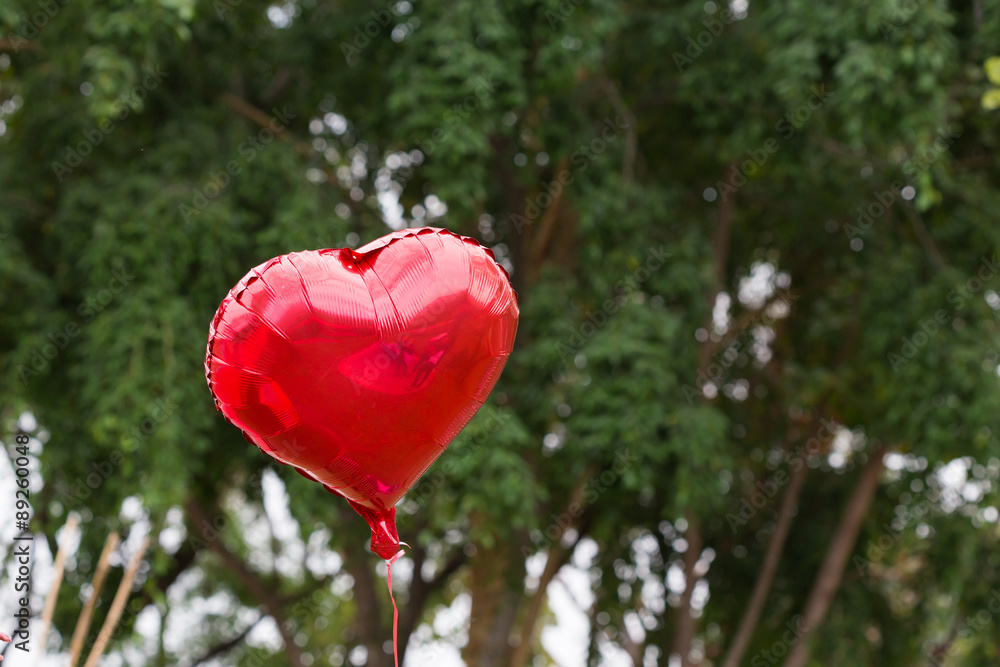 red balloon heart decorated in the outdoor party red balloon heart decorated in the outdoor party