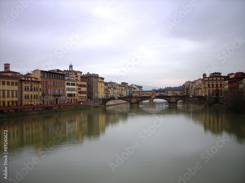 Beautiful renaissance architecture of Florence on the banks of river Arno on a clody day. Italy  Tuscany.