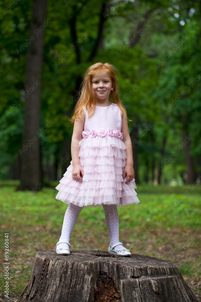Full length portrait of little redheaded girl Full length portrait of little redheaded girl