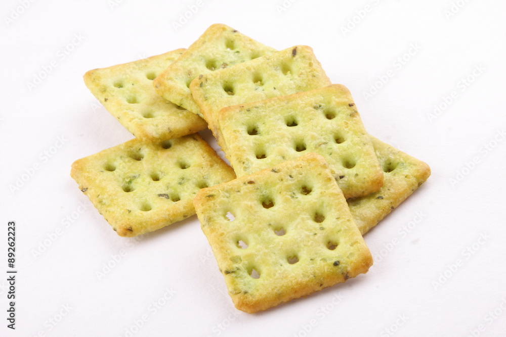 Crispy mint crackers in square shape on white background Crispy mint crackers in square shape on white background