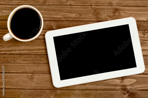 Tablet with coffee cup