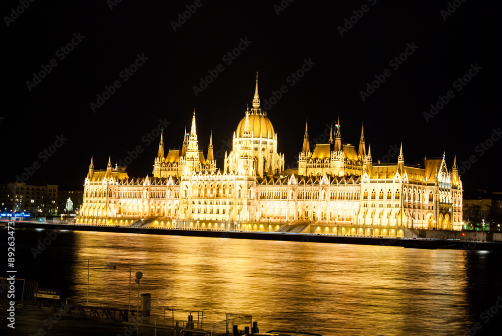 Fototapeta premium The Hungarian Parliament Building with bright and beautiful illu