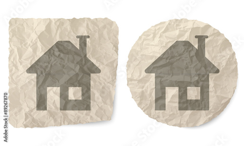 Crumpled slip of paper and a home symbol