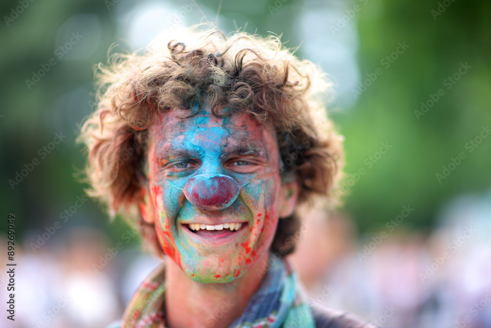 Face of a laughing clown at holi festival Face of a laughing clown at holi festival