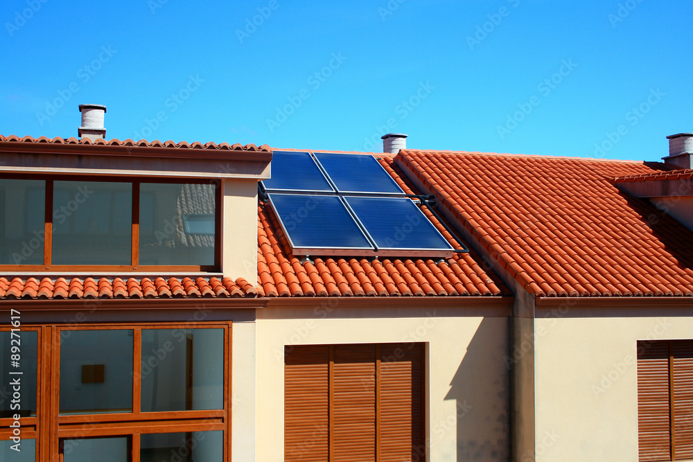 Solar panels over a home roof