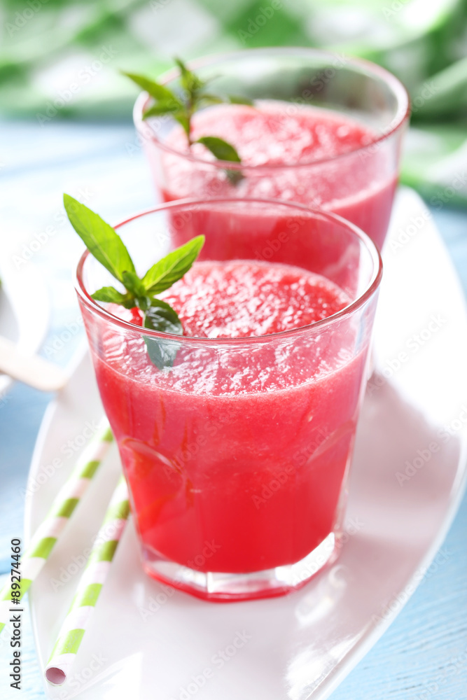 Fresh watermelon juice in the glass on wooden table Fresh watermelon juice in the glass on wooden table