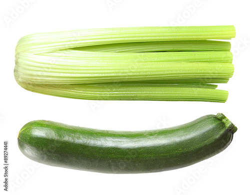 Celery and zucchini isolated on white background