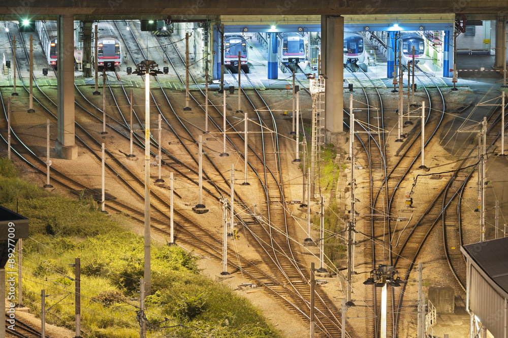 Fototapeta premium Train tracks in switch yard hongkong by night