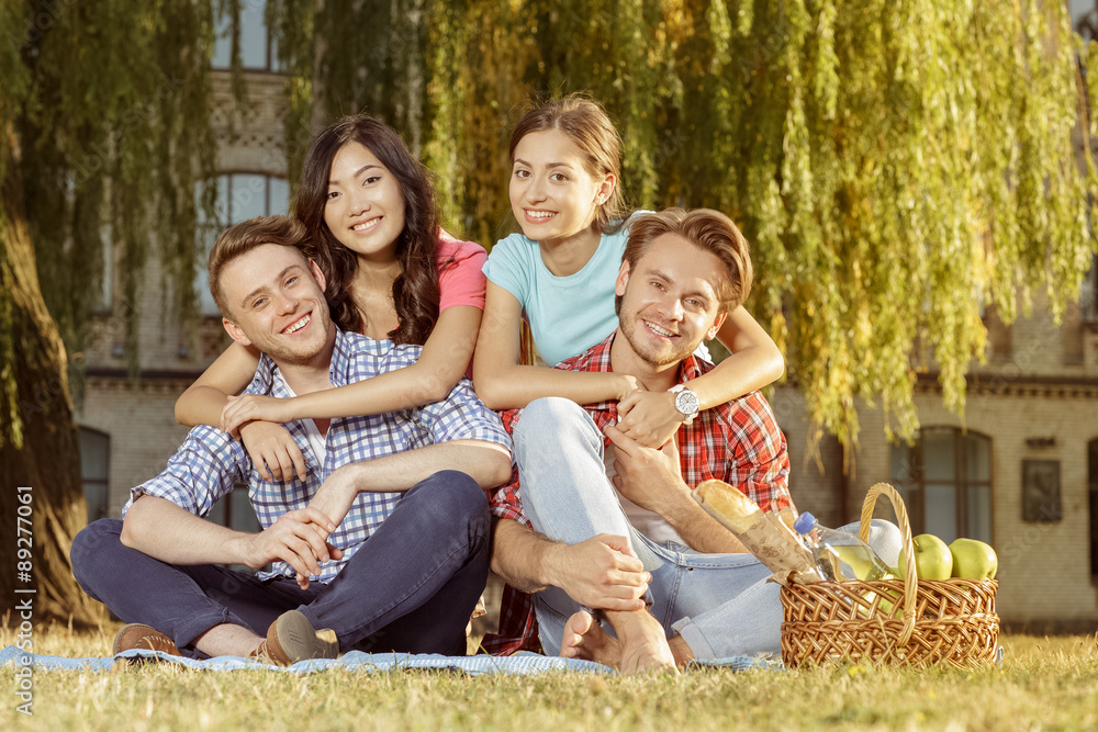 Fototapeta premium Funny student relaxing in the park