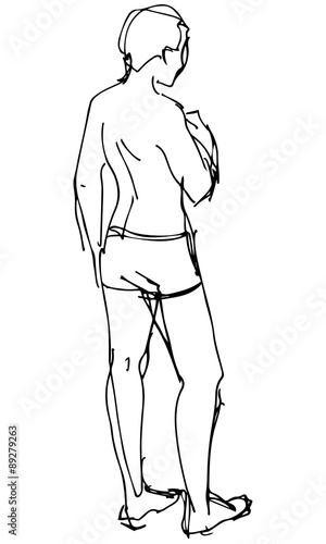 a man in a bathing suit turned back