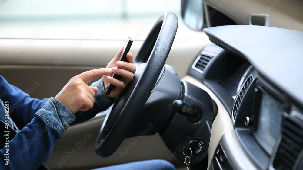 woman driver use her cell phone driving car woman driver use her cell phone driving car