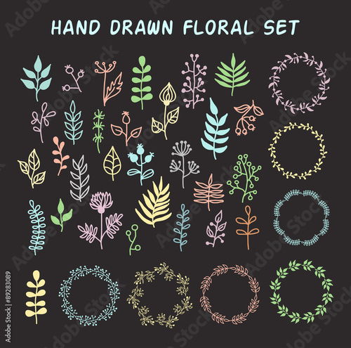 Vintage set of hand drawn rustic floral elements and wreath in pastel colors.