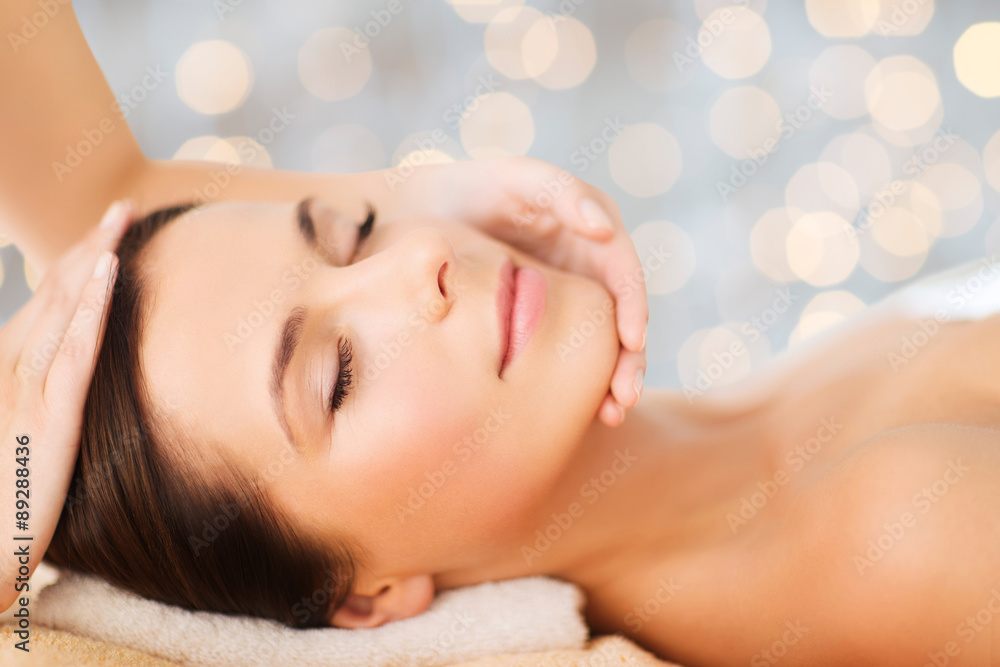 beautiful woman in spa salon having facial massage beautiful woman in spa salon having facial massage