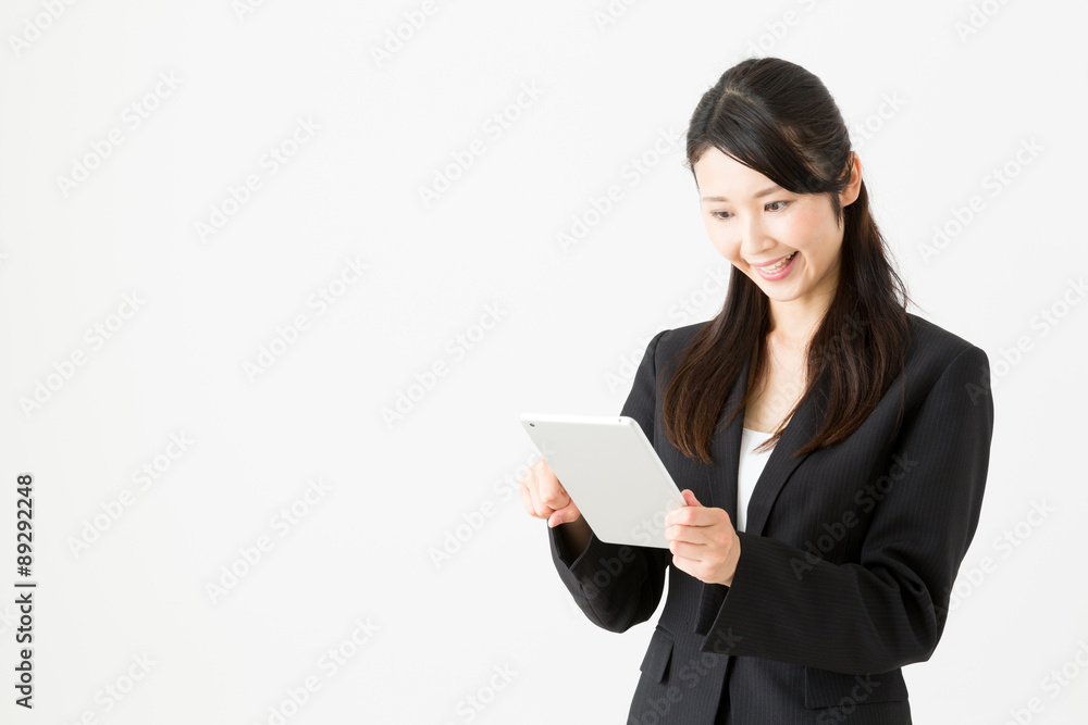 asian businesswoman using tablet on white background asian businesswoman using tablet on white background