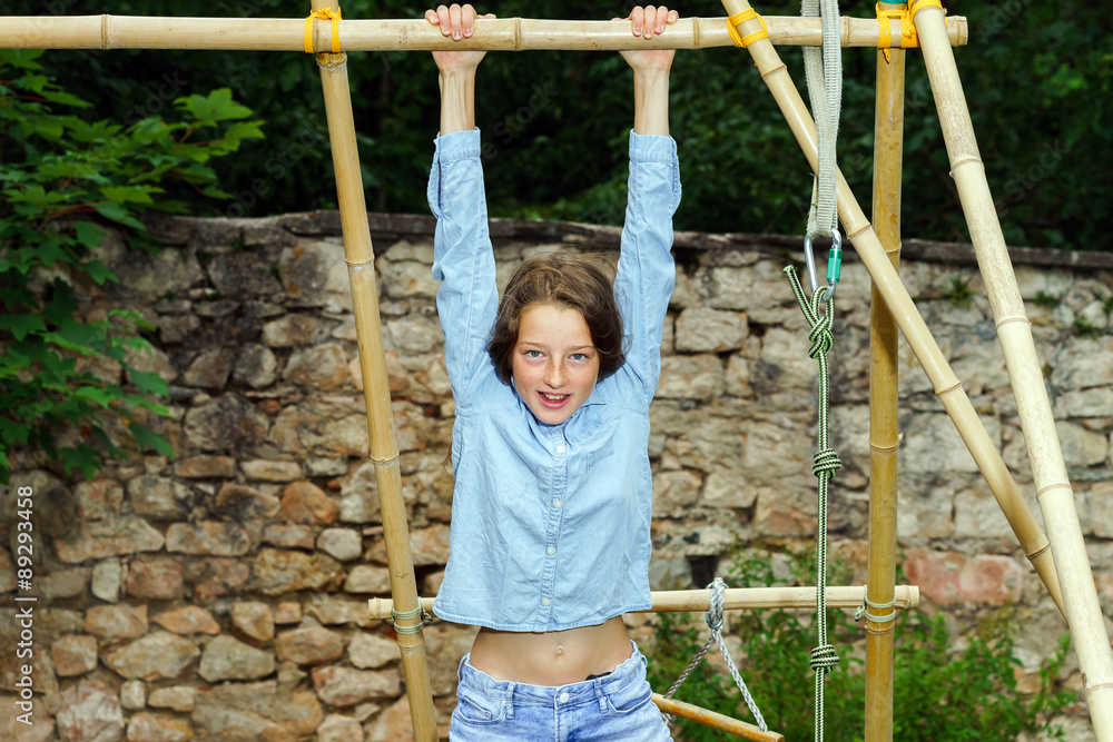 Fototapeta premium Moving into adulthood. Outdoor portrait of teenage girl.