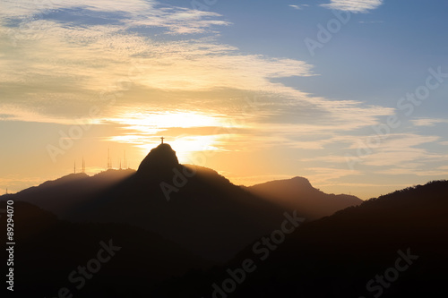 Sunset behind Mountain Corcovado Christ the Redeemer  Rio de Jan
