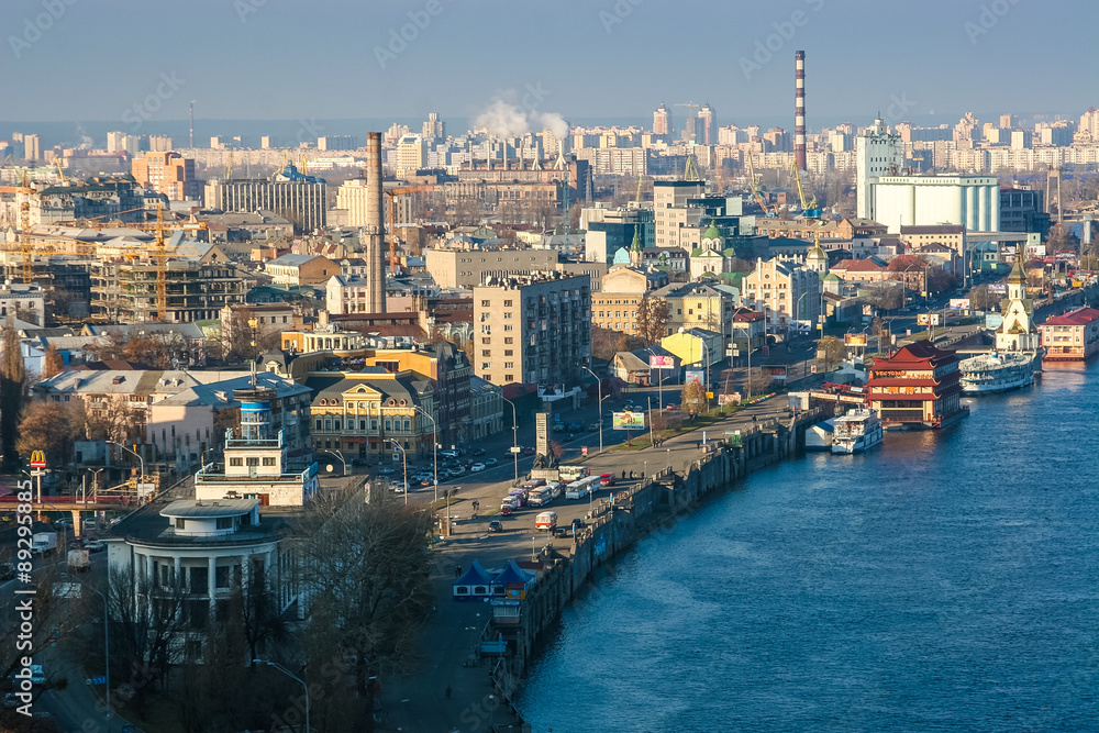 Fototapeta premium View from the hill to the old part of Kiev, river station.