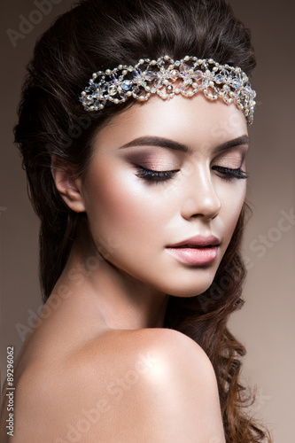 Close-up portrait of beautiful woman with bright make-up