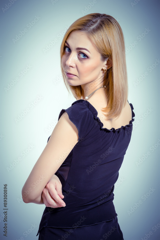 Woman looking over shoulder Woman looking over shoulder