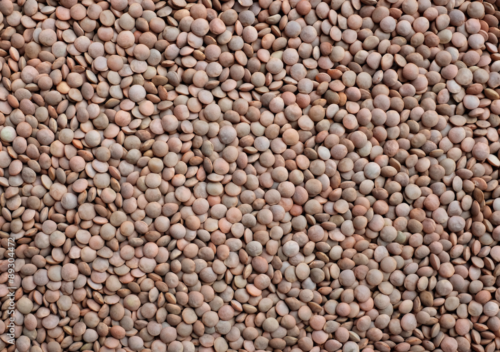 Brown lentils background Brown lentils background